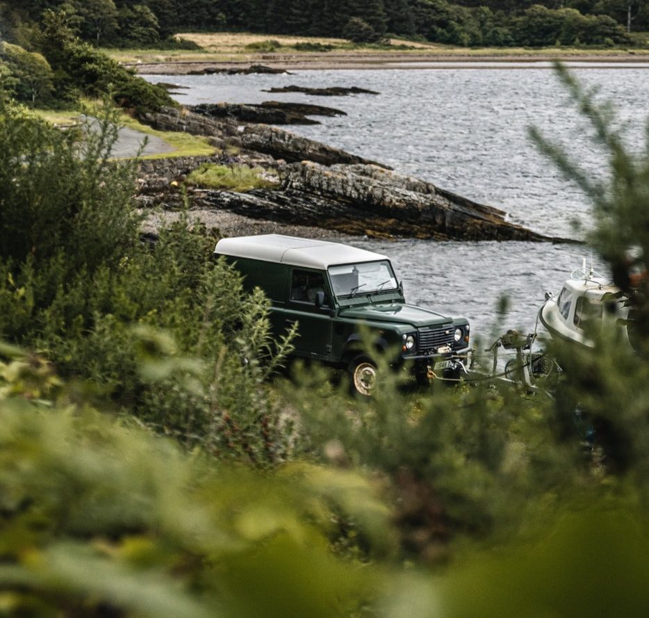 Land Rover Defender at lake